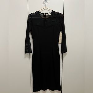 Never worn. Tag on. Mesh top